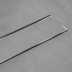 Ducha de rejilla oculta con microcemento