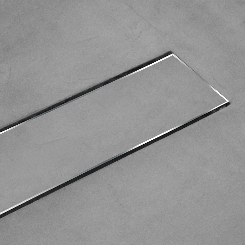 Ducha de rejilla oculta con microcemento