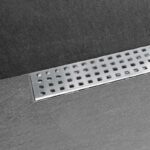 Kit de sumidero BASIC y rejilla lineal de 61 mm de ancho, con doble acabado: revestible y acero inoxidable.